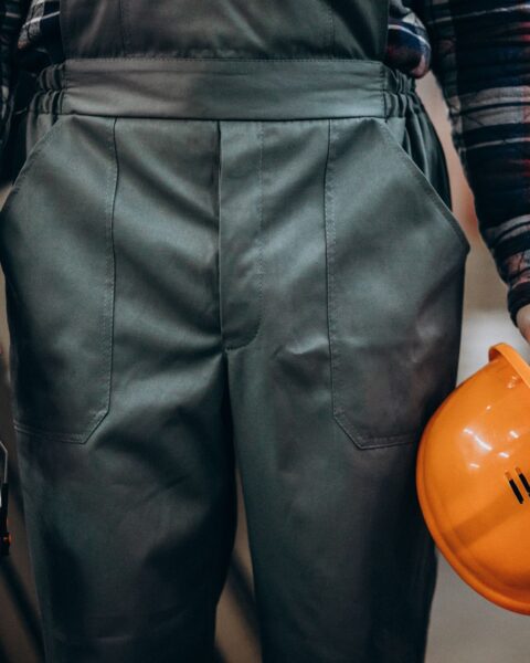 young-male-handyman-with-safety-earphones